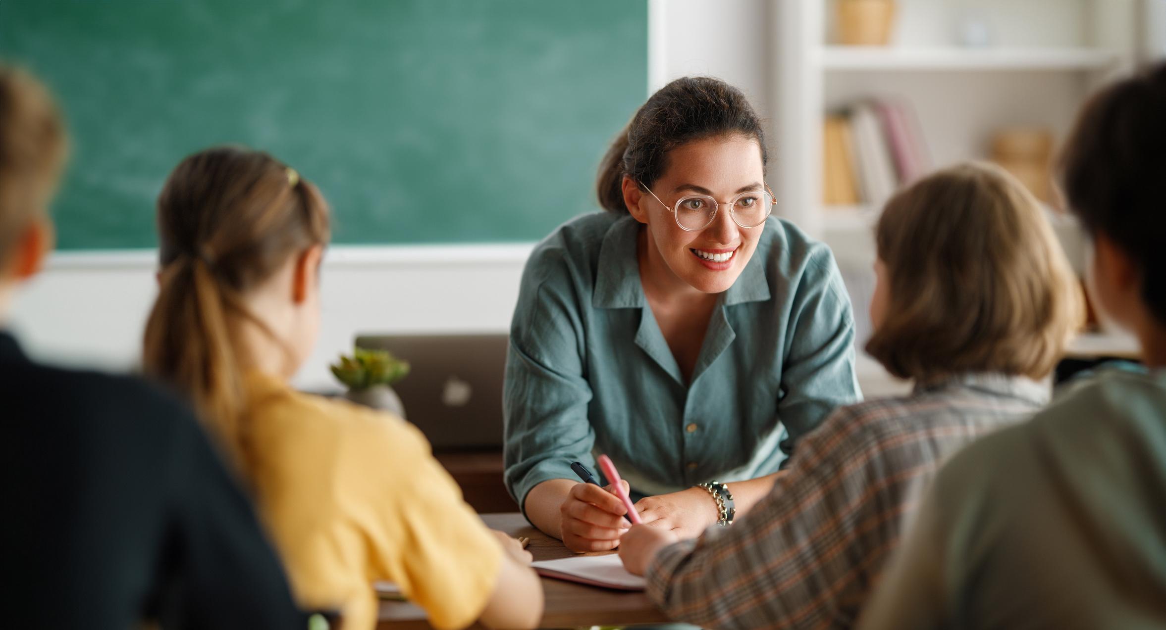 teacher talking to students